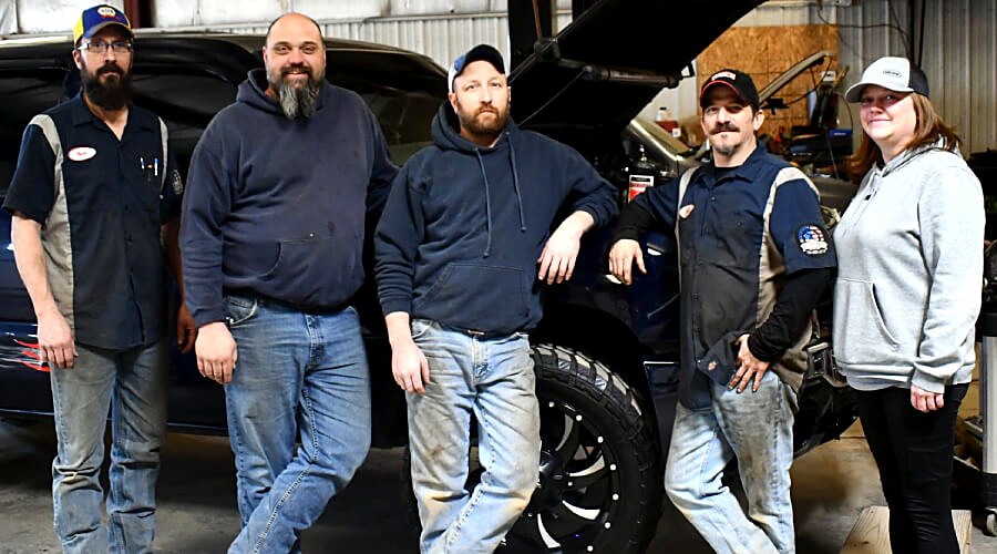 The Joe's Auto Service crew in the shop